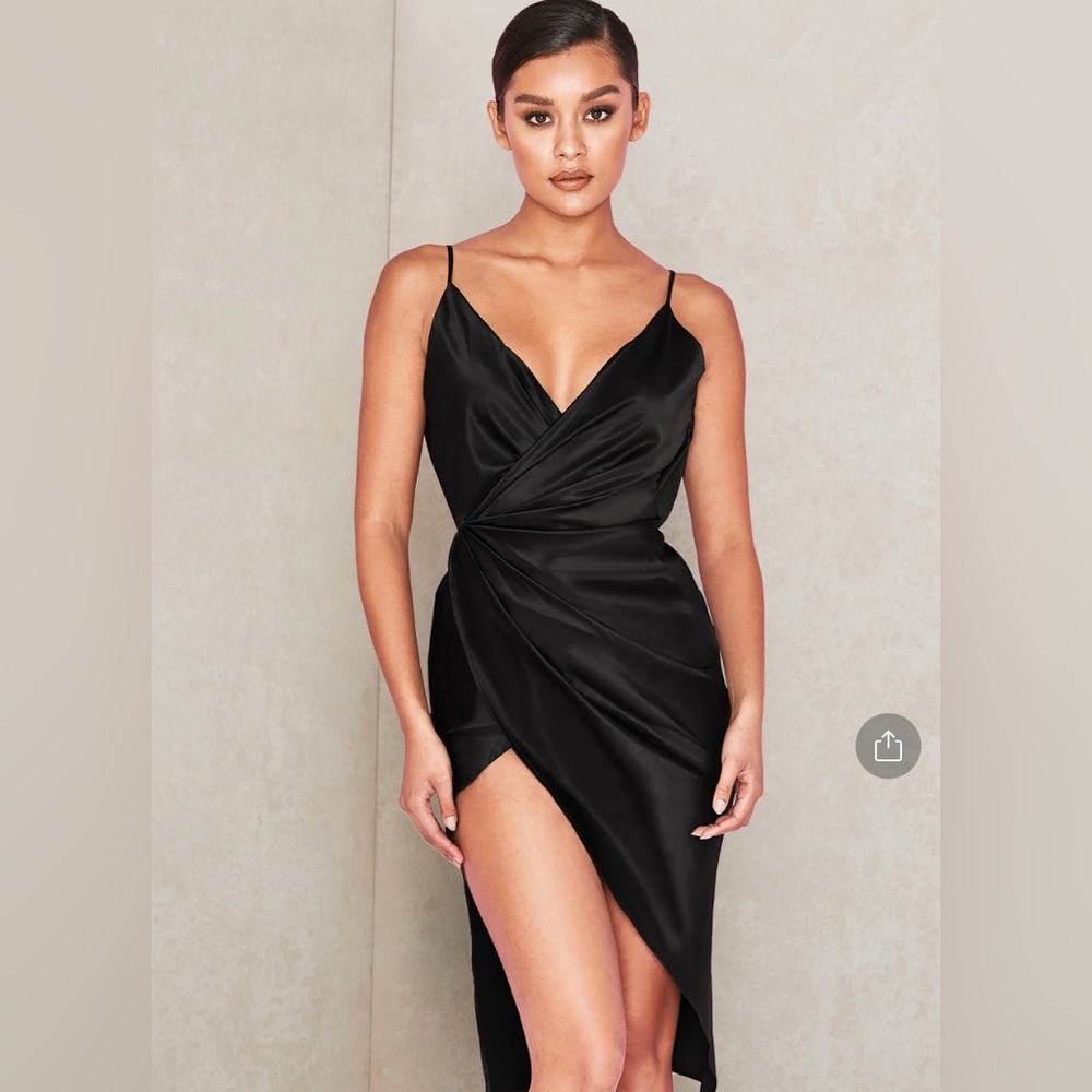 House of CB London faux wrap dress. Side zip. New with tags & security ribbon.